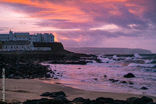 Dusk sunset over Domincan College Portstewart, County Londonderry, Northern Ireland, Causeway Coast Area of Outstanding Natural Beauty photo