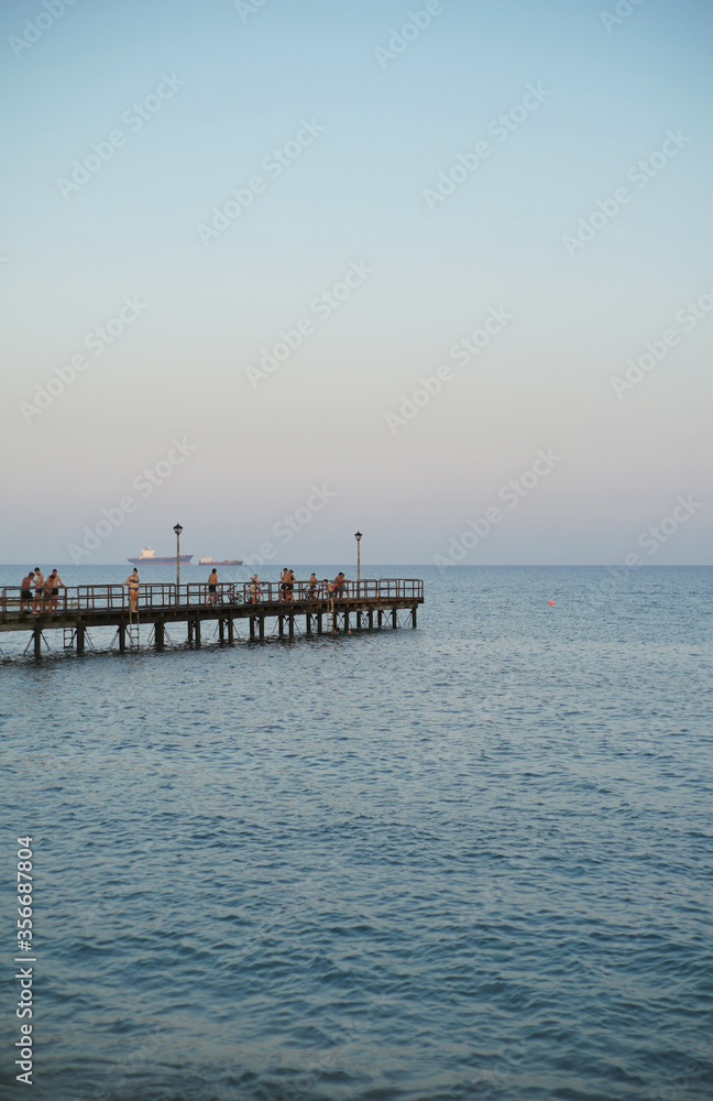 Limassol molos pier with people walking on summer day