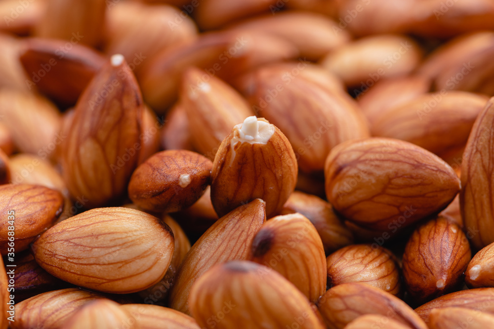 Almond beans soak in water overnight to get the most benefits before to made almond milk, Health food with good fats and down aging, Antioxidants and lower cholesterol levels, Selective focus. Almond beans soak in water overnight to get the most benefits before to made almond milk, Health food with good fats and down aging, Antioxidants and lower cholesterol levels, Selective focus.