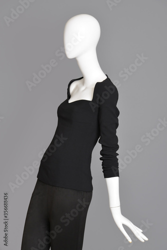 Fotografie lifeless mannequin with black clothes isolated grey background studio