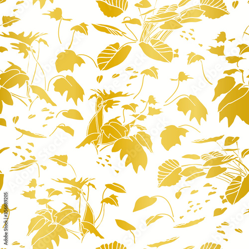 Modern exotic jungle leaf gold pattern. Tropical botanical leaf, cut out design on gold background. Elegant, classy seamless design.