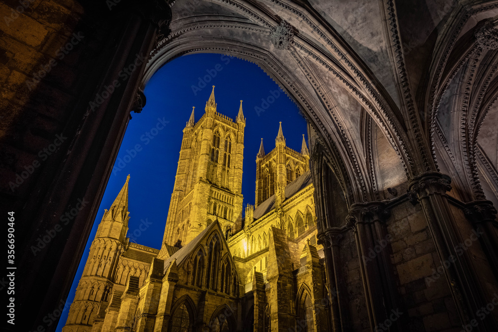 Ancient streets of historical city Lincoln, fantastic adventure travel destination or holiday vacation to view picturesque scenery day or night, sunrise or sunset