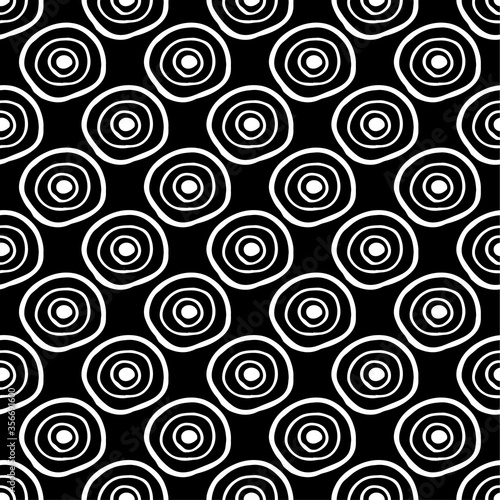 Abstract seamless pattern with hand drawn circle doodles on black background. Stock vector
