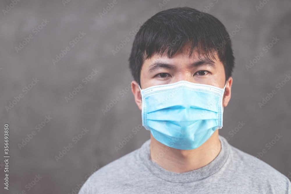 Man wearing hygienic mask to prevent flu