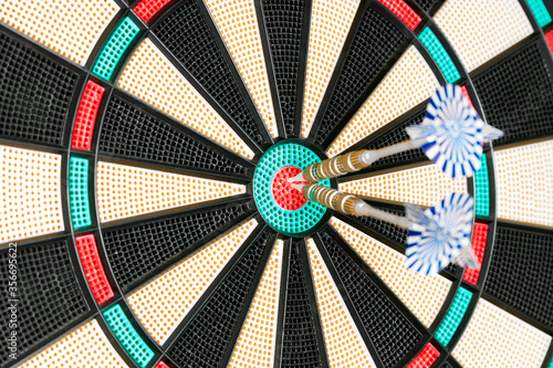 Two Arrows In The Centre Of A Dart Board