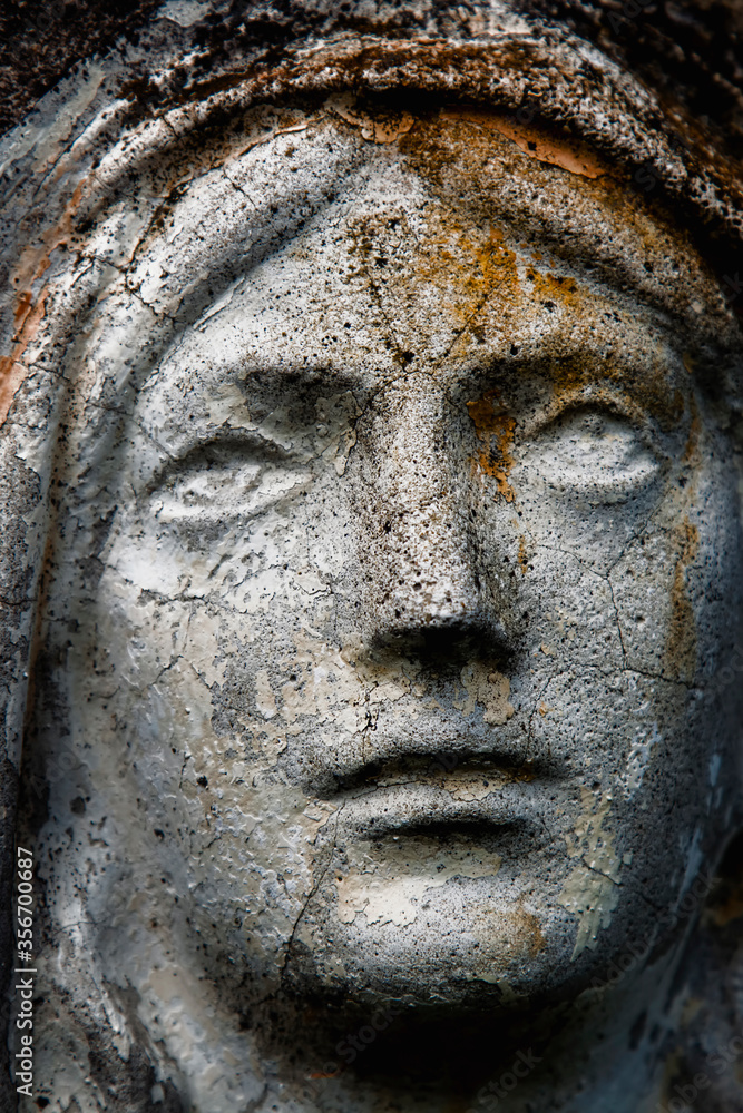 Virgin Mary. Ancient statue. Religion, faith concept