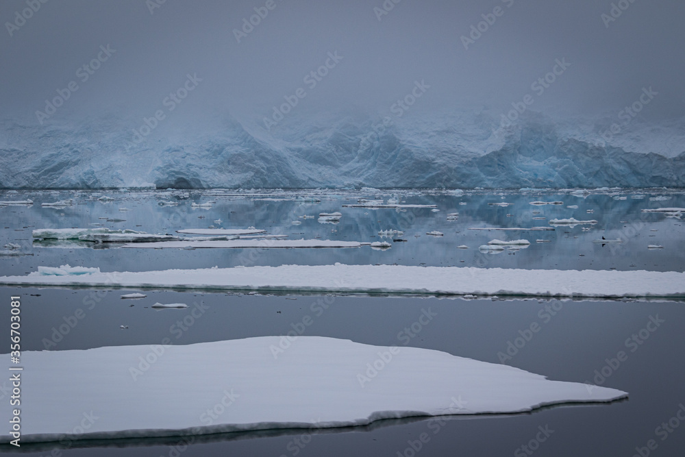 Naklejka premium Icebergs along the Grandidier Channel, Antarctica