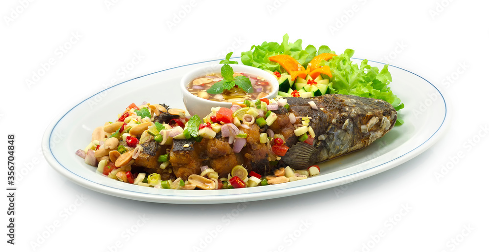 Fried Fish Snakehead with Chili Fish Sauce Salad mixed herbs Thai Food Fried Fish Snakehead with Chili Fish Sauce Salad mixed herbs Thai Food