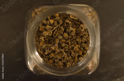 top view of chamomile in a glass jar