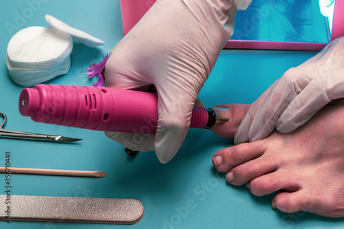 Preparing nails for applying gel polish.
