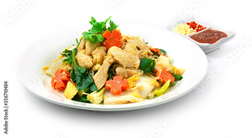 Thai Sukiyaki Stir Fried with Chicken, eggs and Vegetables Carved Carrots flowers shape served Sauce