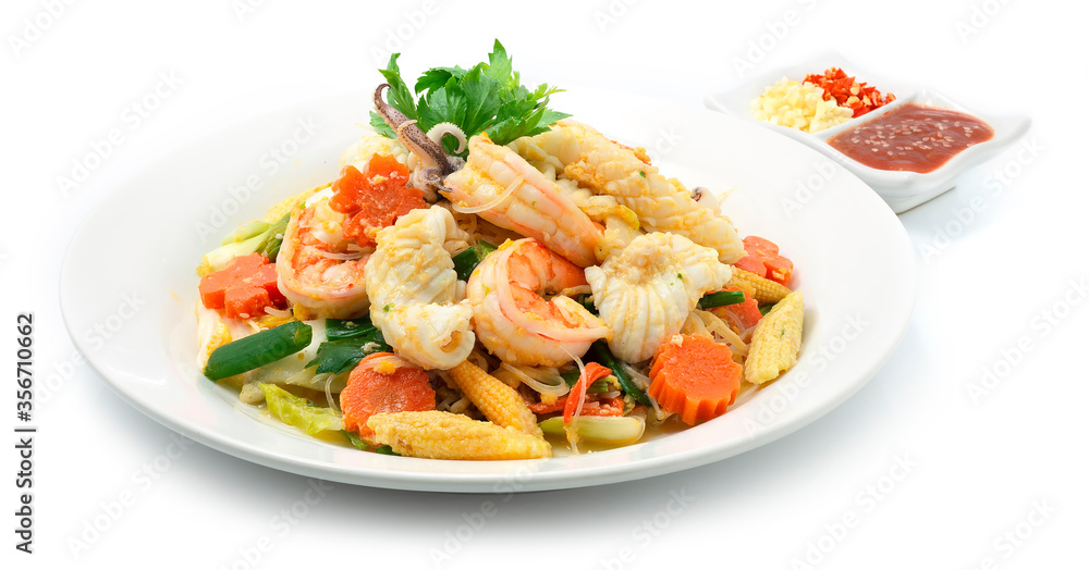 Thai Sukiyaki Stir Fried with Seafood Shrimps,Squids,Egg and Vegetables Carved Carrots flowers shape served Sauce Thai Sukiyaki Stir Fried with Seafood Shrimps,Squids,Egg and Vegetables Carved Carrots flowers shape served Sauce