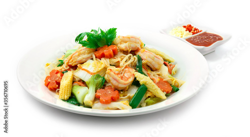 Thai Sukiyaki Stir Fried with Shrimps, eggs and Vegetables Carved Carrots flowers shape served Sauce