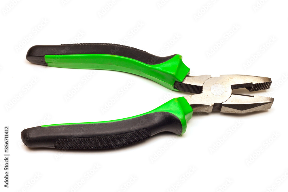 large pliers with green and black handles, on a white background, isolated large pliers with green and black handles, on a white background, isolated
