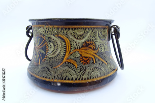 Copper carving and copper bowl, a traditional Middle Eastern art on white background