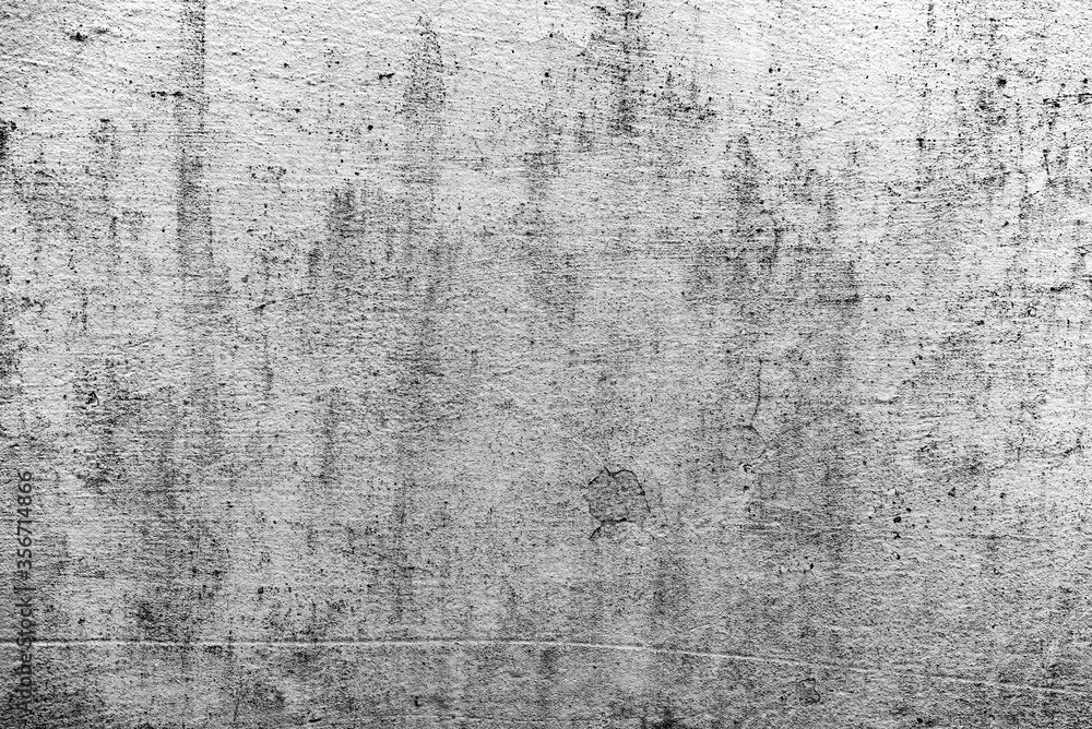 Obraz premium Texture of a concrete wall with cracks and scratches which can be used as a background