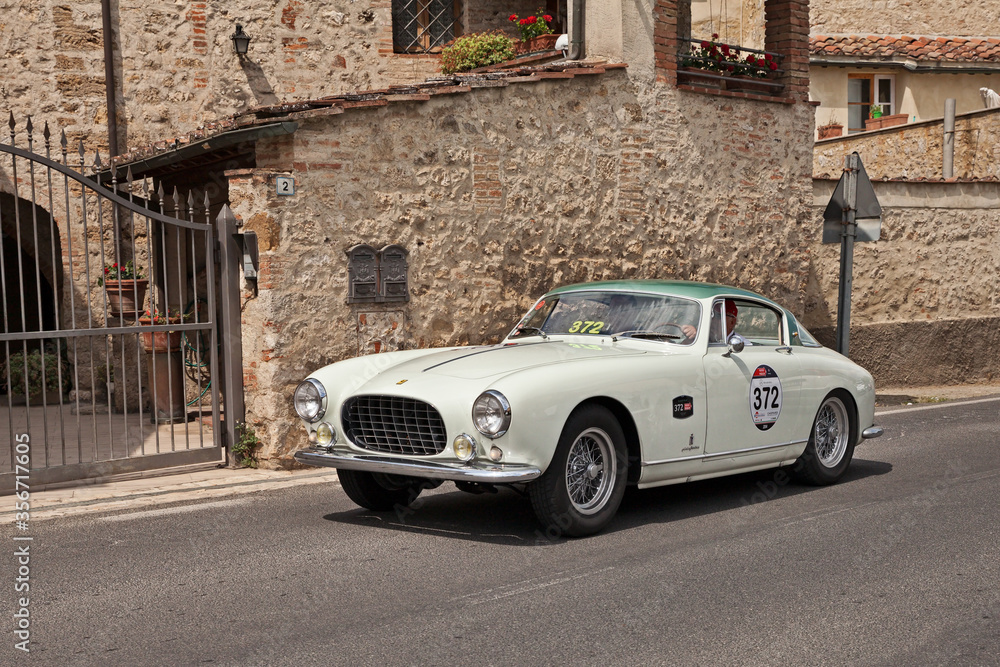 Ferrari 250 GT Europa (1955) in classic car race Mille Miglia, on May 17,  2014 in Colle di Val d'Elsa, Tuscany, Italy Photos | Adobe Stock