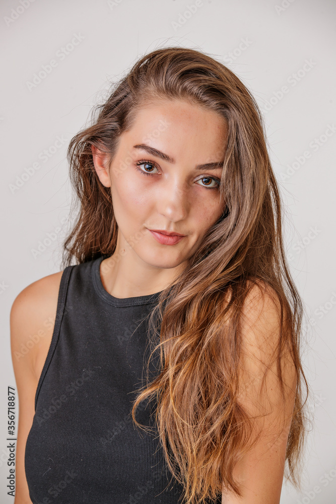 Very Pretty model in the studio slim and well built nice hair black dress Very Pretty model in the studio slim and well built nice hair black dress