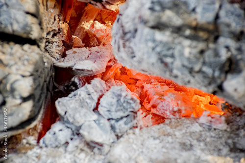 red coals in a fire closeup