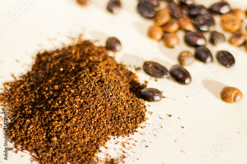 Coffee beans and powder coffee on the white background  studio shoot.