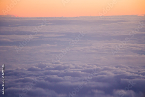 Above the clouds landscape of clouds  clouds at the sunset.