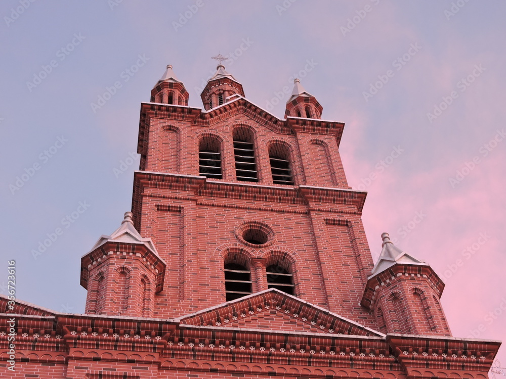 Brick tower of an emblematic and very crowded church in Colombia