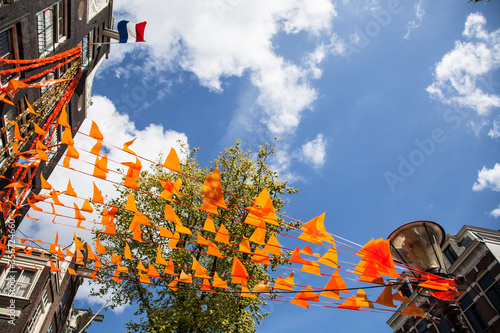 The Netherlands flag and decorations on King's day in Amsterdam