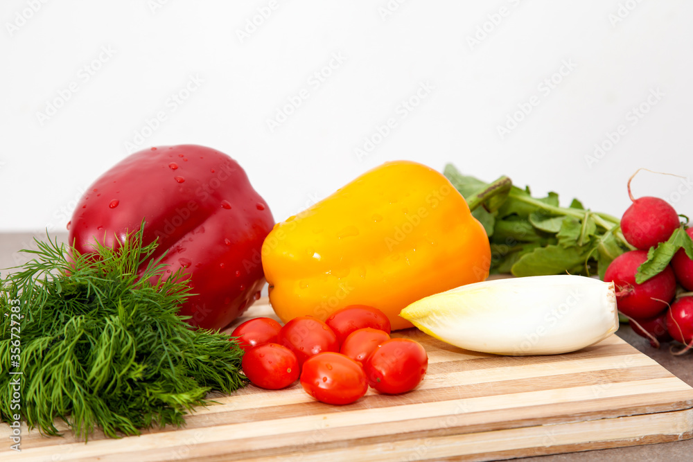 fresh, healthy vegetables waiting to be cooked on the kitchen table fresh, healthy vegetables waiting to be cooked on the kitchen table
