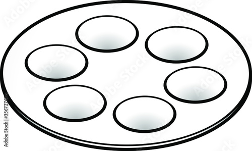 A white Passover seder plate.