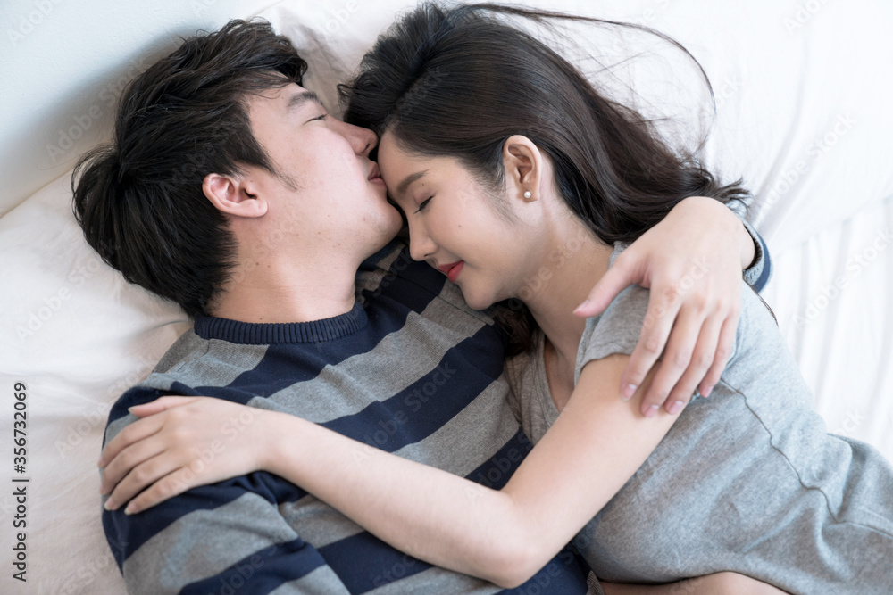 Happy asian couples, They show love by hugging each other. Happy asian couples, They show love by hugging each other.