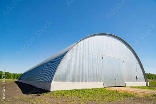 Metal hangars in the field