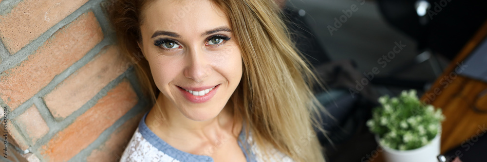 Smiling happy beautiful woman looking at camera Smiling happy beautiful woman looking at camera