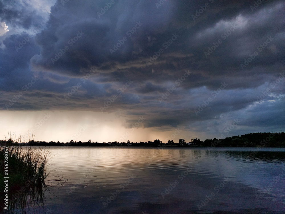 panoramic view of the river in the evening before a thunderstorm