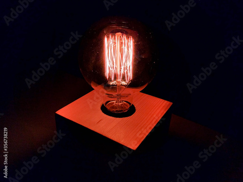 vintage light bulb glows in the dark