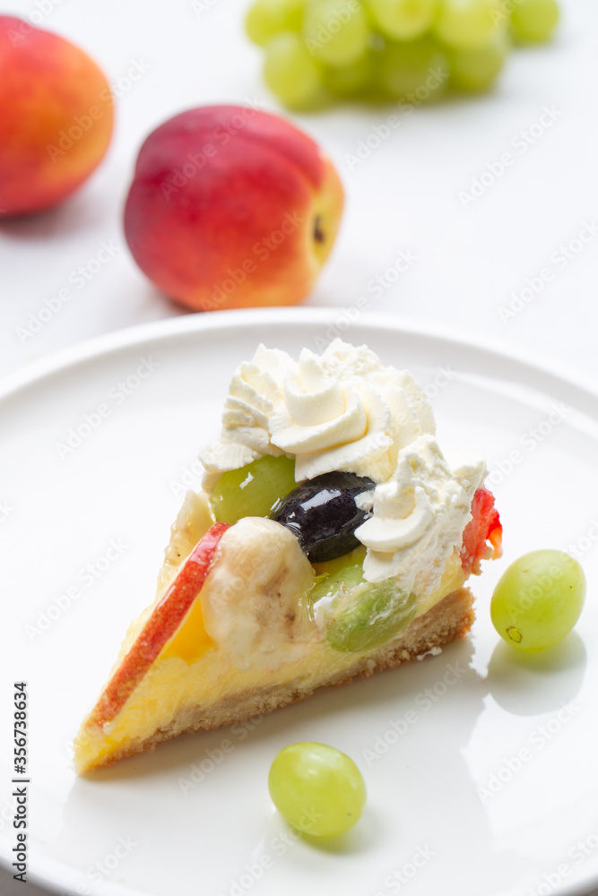 Whipped cream fruit cake slice Whipped cream fruit cake slice