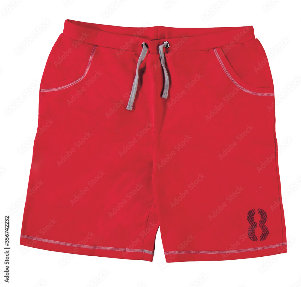 Athletic workout red sports shorts with pockets drawstring. Isolated image on a white background. Athletic workout red sports shorts with pockets drawstring. Isolated image on a white background.