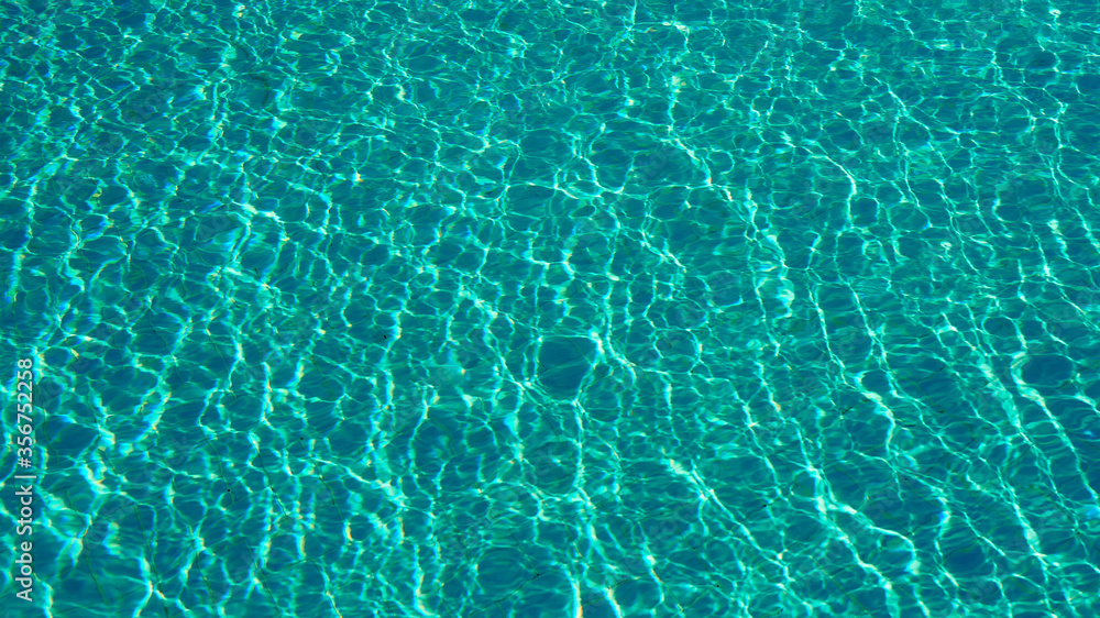 Obraz premium glare of pool water as background texture