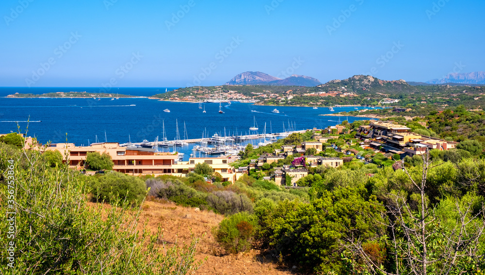 Obraz premium Portisco, Sardinia, Italy - Panoramic view of yacht marina and port of Portisco resort town - Marina di Portisco - at Emerald Cost of Tyrrhenian Sea