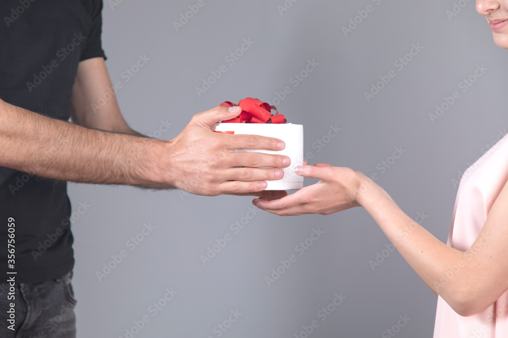 woman and man hand gift box woman and man hand gift box