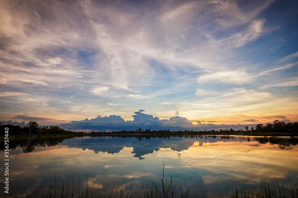 Fototapeta premium sunset with reflection on the lake