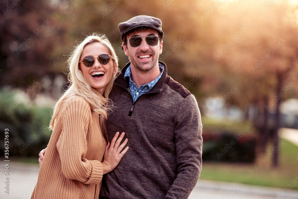 Smiling couple in love outdoors. Smiling couple in love outdoors.
