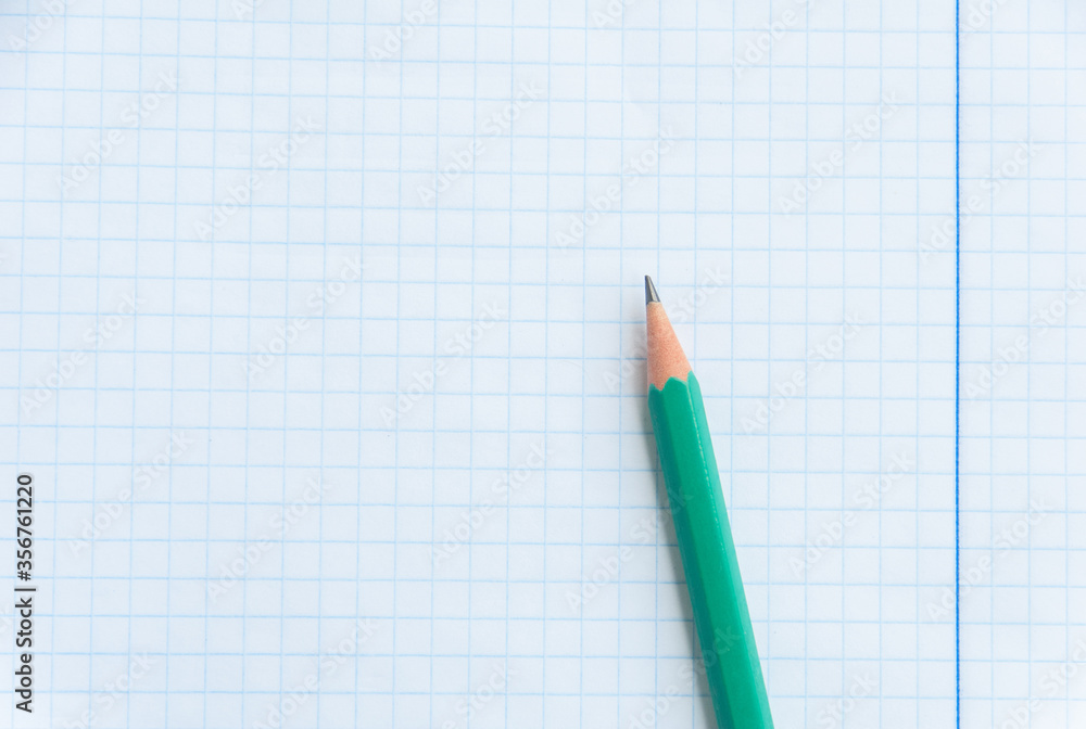 Back to school, education concept. Top view of notebook page and pencil for design a mockup. Education and business concept. Close up. Flat lay. Copy space Back to school, education concept. Top view of notebook page and pencil for design a mockup. Education and business concept. Close up. Flat lay. Copy space