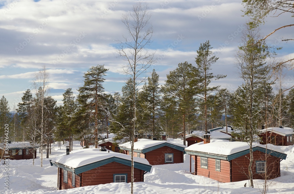 Typical wooden houses in Sweden during winter
