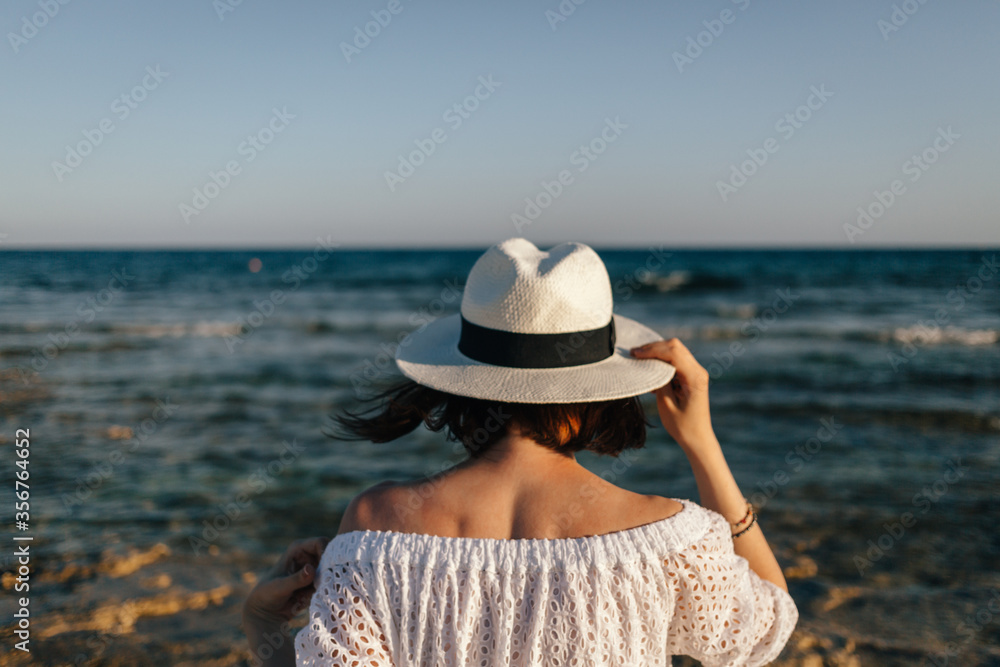 girl in hate looks at the sea