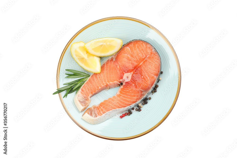 Plate with salmon meat and spices isolated on white background Plate with salmon meat and spices isolated on white background