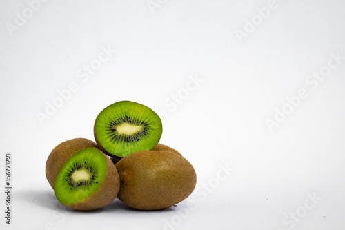 fresh and healthy kiwi fruits isolated on white background