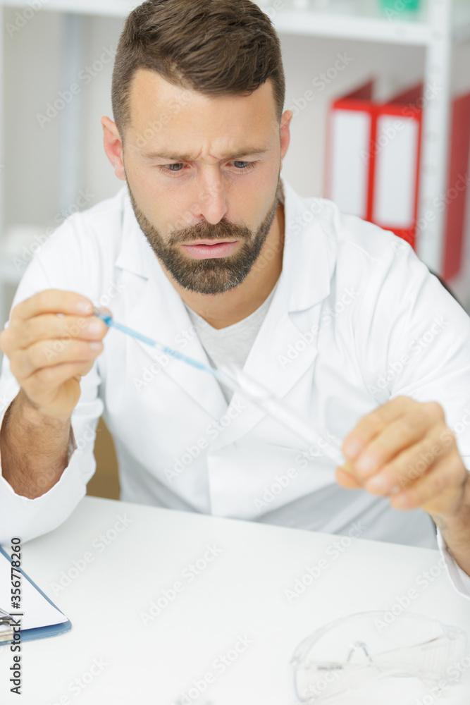 Fototapeta premium scientist is doing chemical lab research