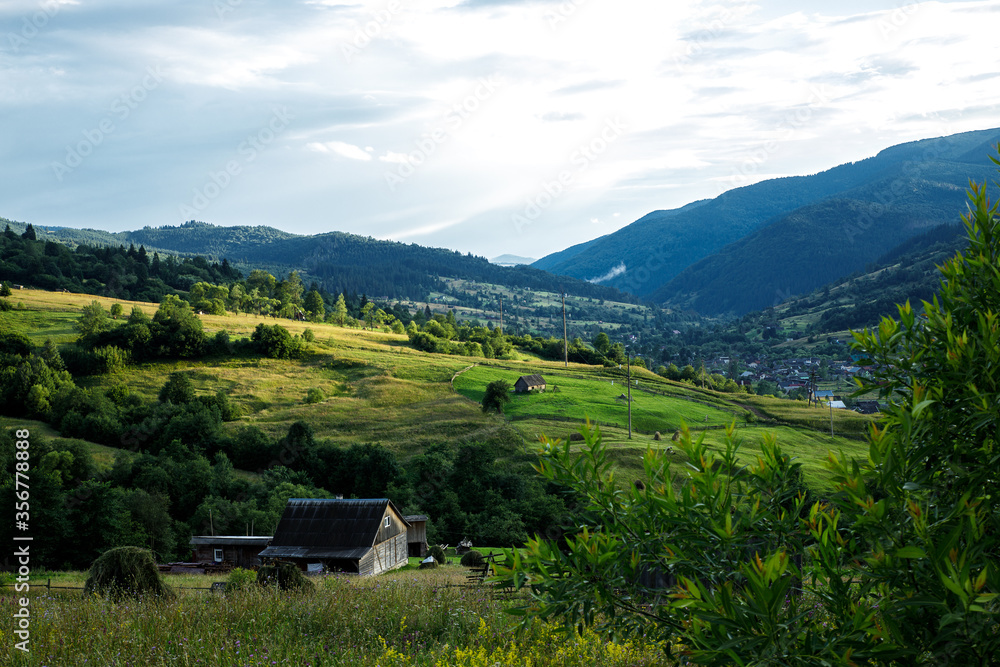 Fototapeta premium Views of the Carpathians - this is a beautiful country in the mountains of the Carpathians after sunset. Carpathians are located in Ukraine. In the Carpathians, beautiful nature.