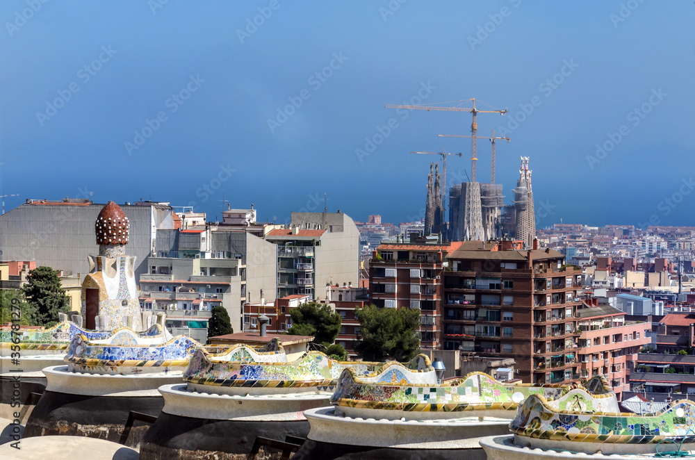 BARCELONA, SPAIN - MAY 11, 2018. View of the Sagrada de Familia under construction from the side of the Park Guell