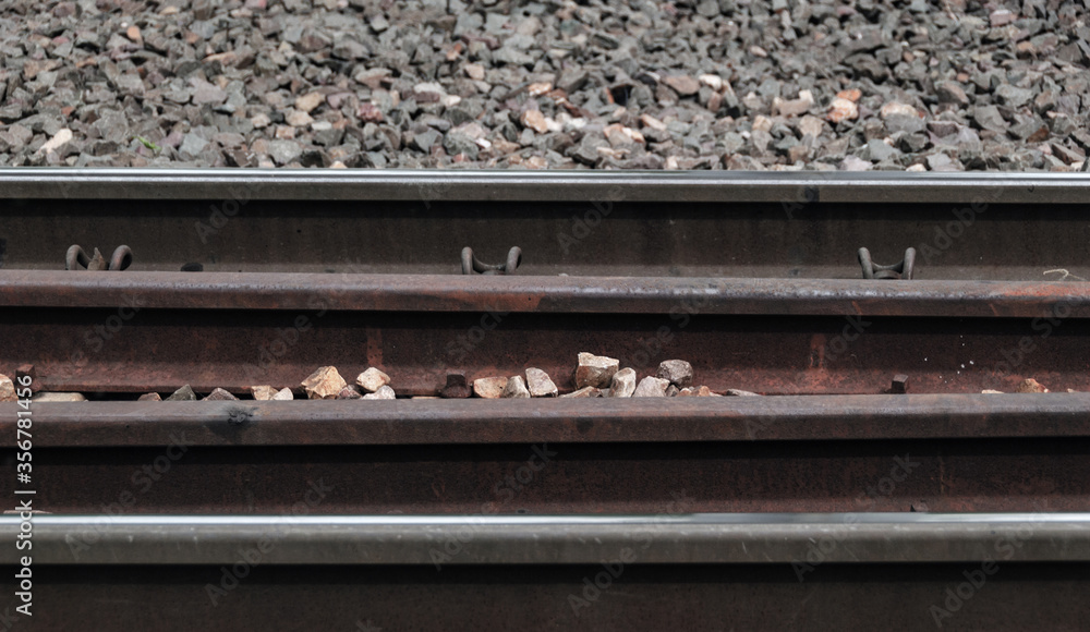Fototapeta premium A closeup of rusty railroad tracks